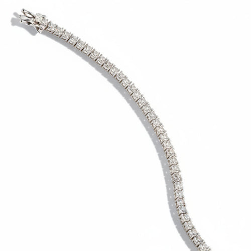 silver-toned bracelet with round 3mm cubic zirconia stones on a white background