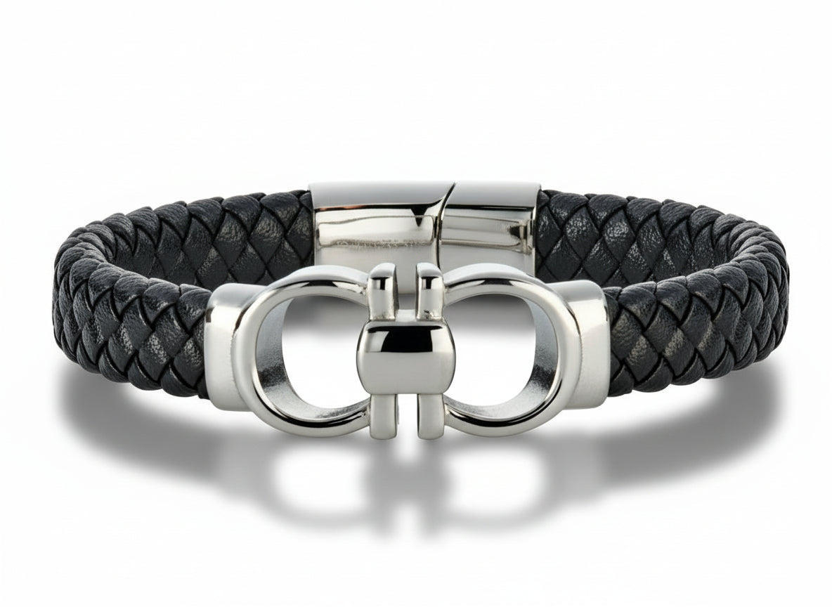 Black braided faux leather bracelet with silver stainless steel clasp on a white background
