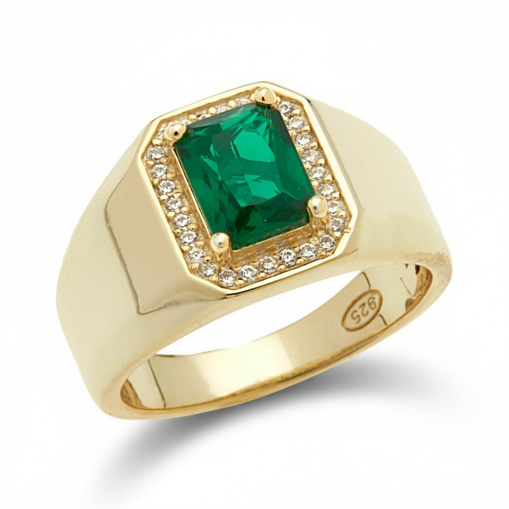 Gold ring with a green rectangular cubic zirconia stone surrounded with a halo of cubic zirconia clear stones
