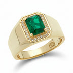 Gold ring with a green rectangular cubic zirconia stone surrounded with a halo of cubic zirconia clear stones