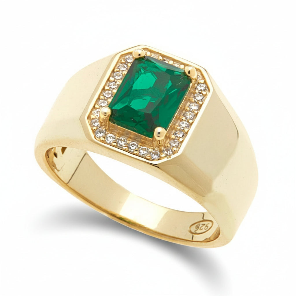 Gold ring with a green rectangular cubic zirconia stone surrounded with a halo of cubic zirconia clear stones