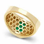 The insize of a gold ring with a green rectangular cubic zirconia stone surrounded with a halo of cubic zirconia clear stones