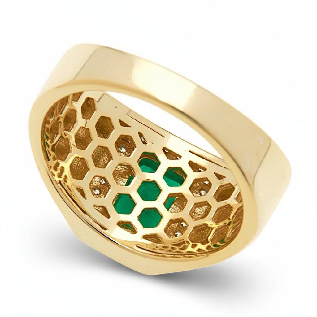 The insize of a gold ring with a green rectangular cubic zirconia stone surrounded with a halo of cubic zirconia clear stones