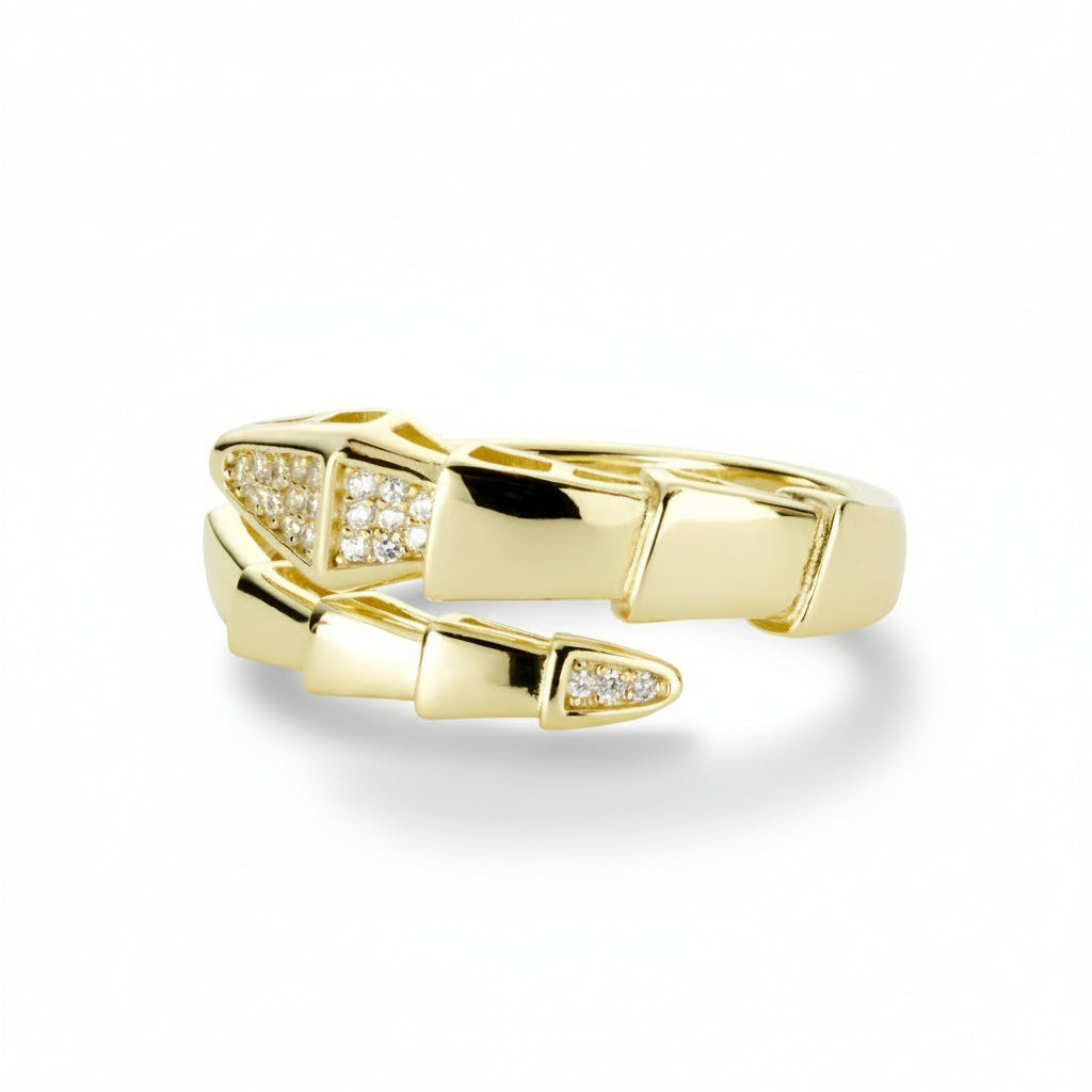 Gold-tone sculpted snake wrap ring with pavé cubic zirconia accents and a dimensional segmented design.