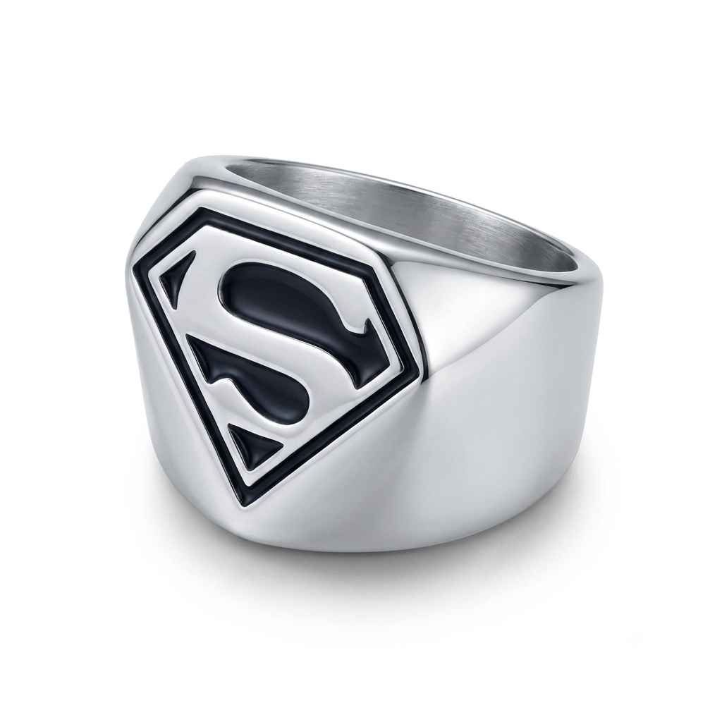A silver-toned stainless steel metal signet ring featuring a black and silver Superman 'S' shield emblem on the face, shown on a clean white background.