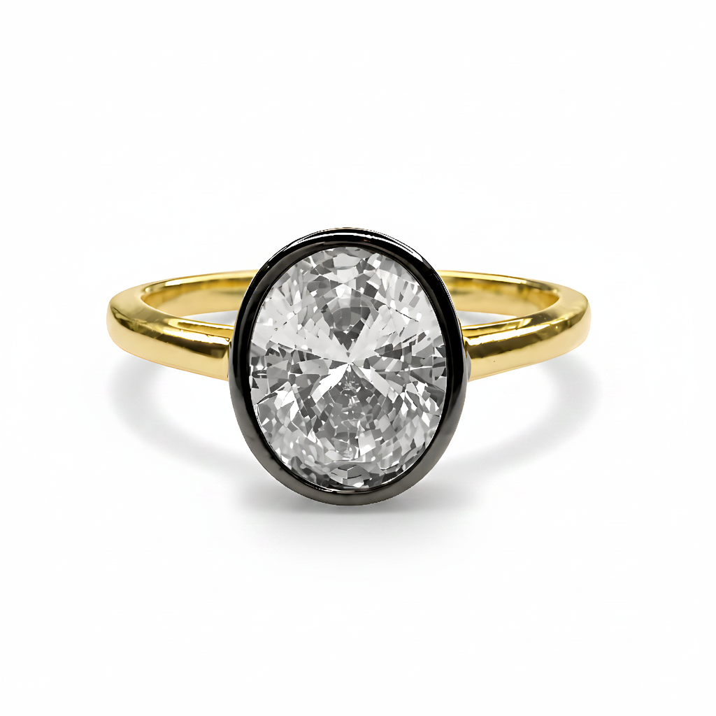 A yellow gold ring featuring a large, oval-cut clear gemstone in a bezel setting with a black border, shown on a plain white background.