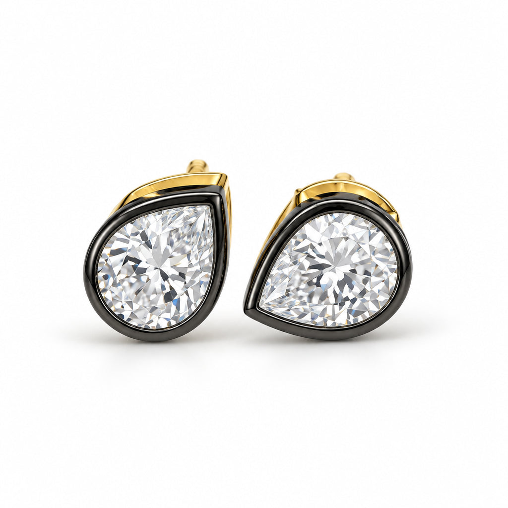 Pear / tear drop CZ stud earrings with black enamel bezel, crafted in sterling silver with 14K gold and rhodium plating.