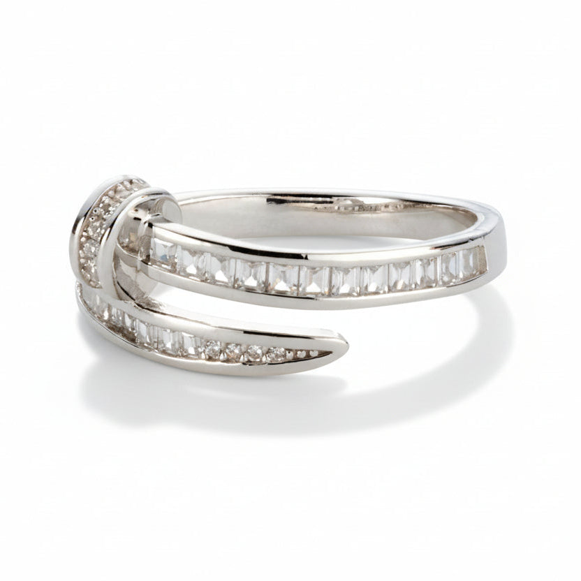 Silver-tone Nail Baguette Wrap Ring with channel-set baguette cubic zirconia stones and pavé cubic zirconia accents.