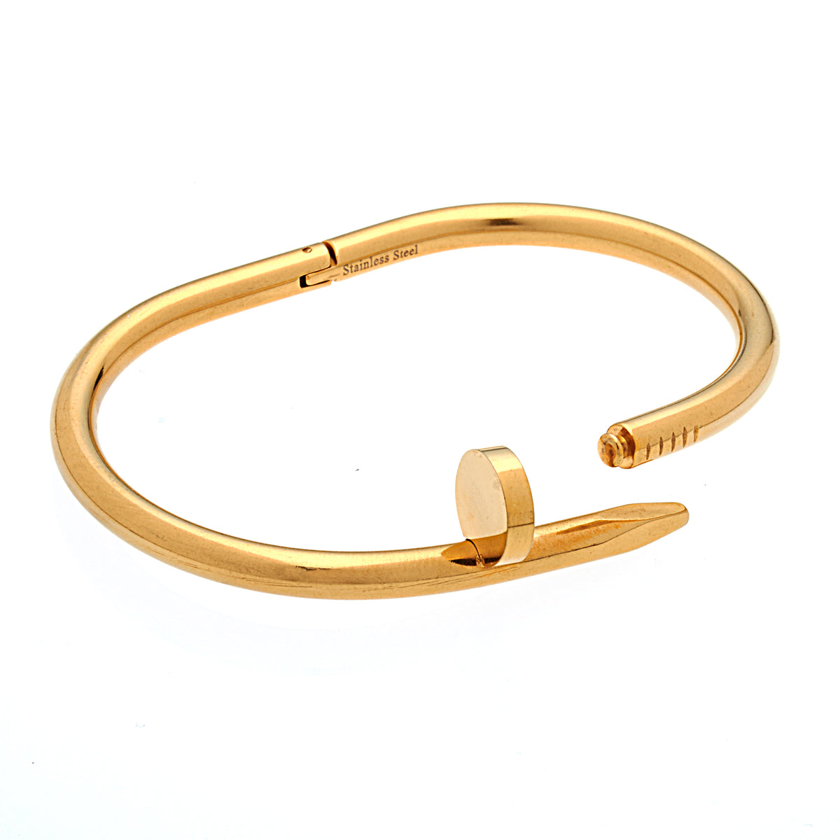 Stainless steel bangle in a gold tone with a nail design on a white background