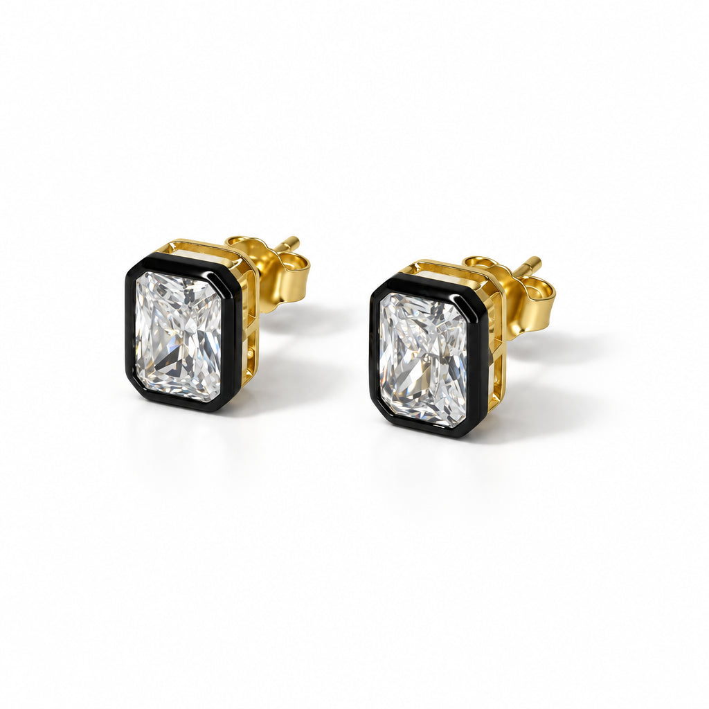 Side view of round CZ stud earrings with black enamel bezels, sterling silver with 14K gold and rhodium plating, and post backs.
