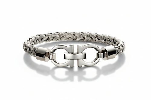 Silver stainless steel bracelet with braided design and double buckle clasp on a white background