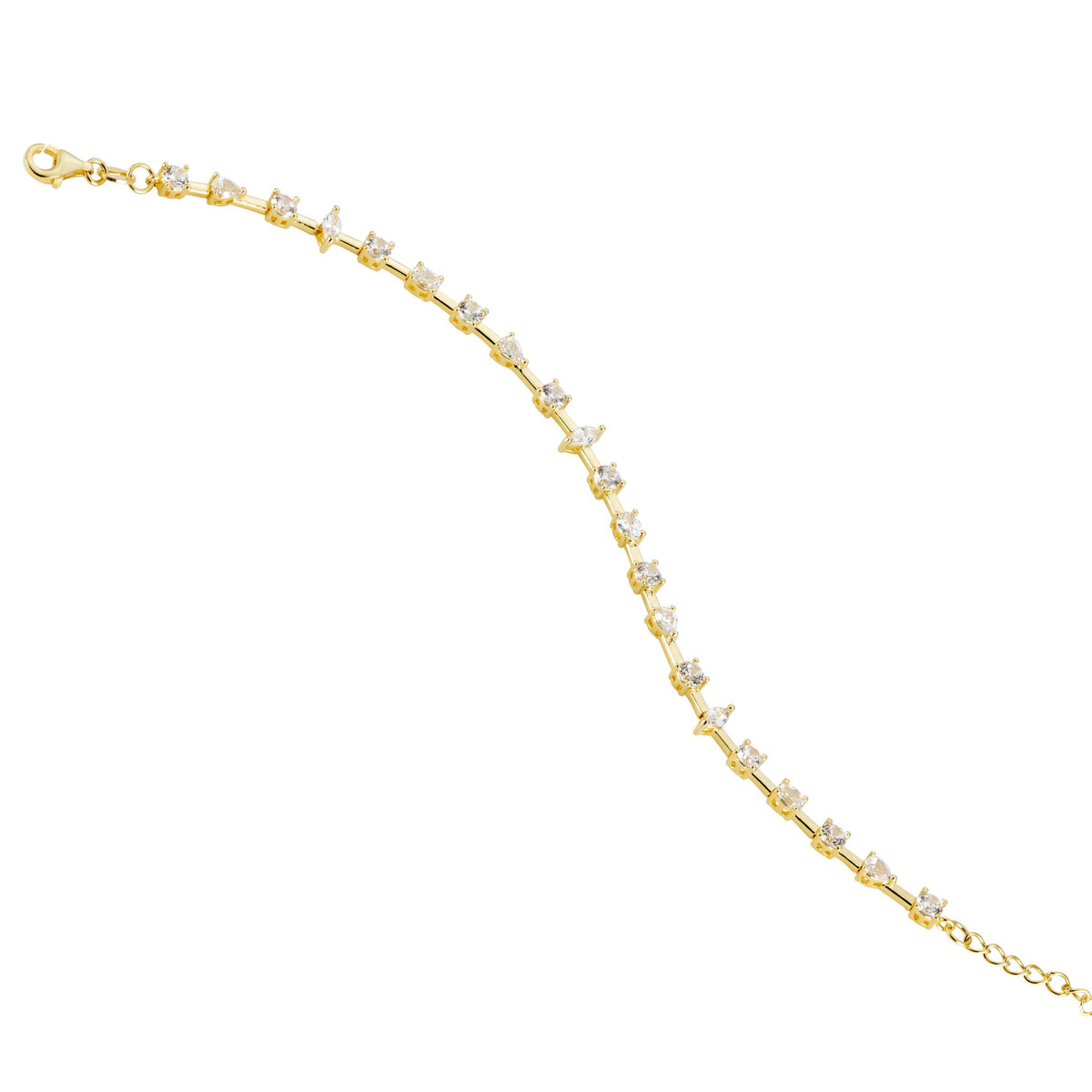 Gold bracelet with different shaped cubic zirconia stones on a white 